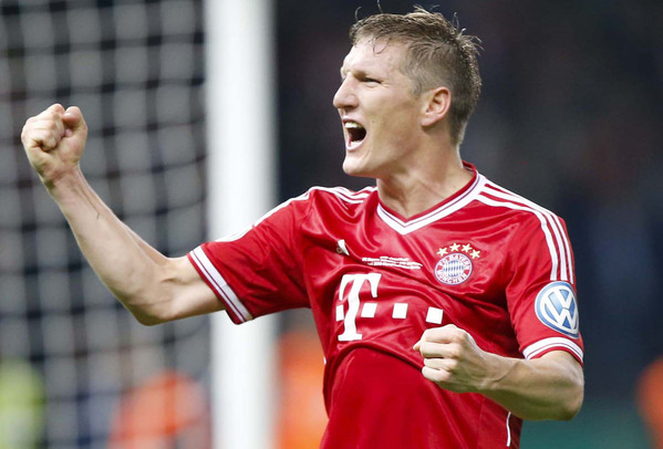 Bayern Munich's Schweinsteiger celebrates victory over VfB Stuttgart in their German soccer cup (DFB Pokal) final match at the Olympic Stadium in Berlin