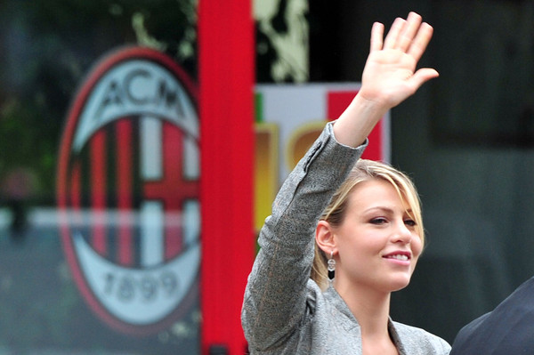 Barbara Berlusconi gestures as she leave