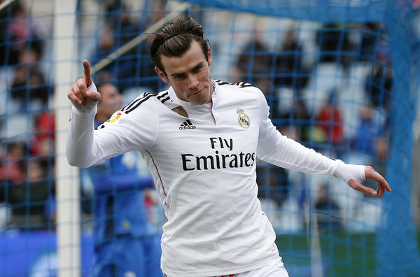 Real Madrid's Bale celebrates after scoring a goal against Getafe during their Spanish first division soccer match in Getafe