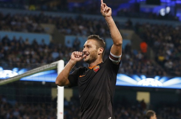 AS Roma's Totti celebrates scoring a goal against Manchester City during their Champions League soccer match at the Etihad Stadium in Manchester
