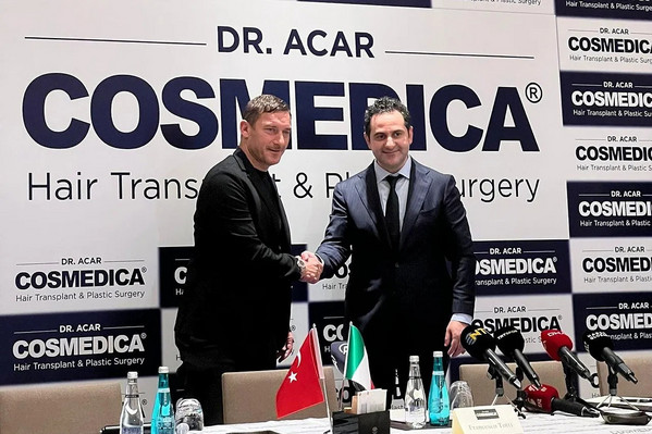 totti trapianto pubblicità